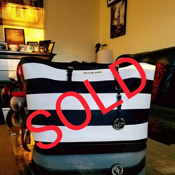 Michael Kors Handbags - Michael kors black and white jetset travel tote
